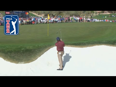 Phil Mickelson rattles the flagstick at Waste Management