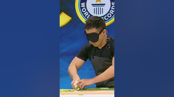 Most slices of cucumber sliced in 30 seconds - 166 by Wallace Wong 🔪