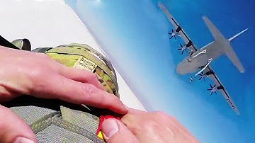 Jumping From a US C-130 Plane During Massive Static Line Jump