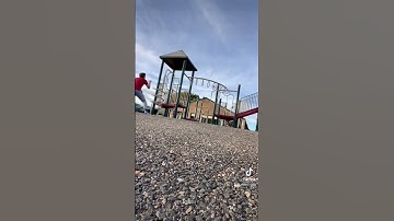 Trickshot Throw Through The Playground Bars🏈😱#short #trending #tiktok #viral #trickshots #foryou