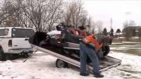 Grip Glides on tilt snowmobile trailer unload