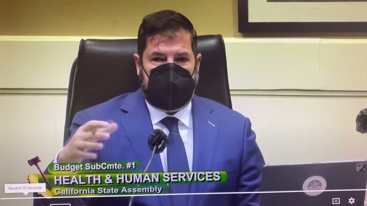 Assemblymember Dr. Joaquin Arambula compliments SPARC Student Leader and her Power Ranger