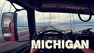 Driving over Mackinac Bridge in Michigan over the straight between lake Michigan and Lake Huron. POV