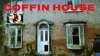Creepy coffin house