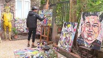 Họa sĩ vẽ tranh chân dung hai nhà lãnh đạo Mỹ - Triều