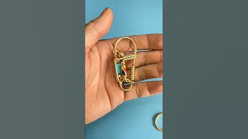 The process of turning brass copper wire into a keychain #handmade #keychain #brass