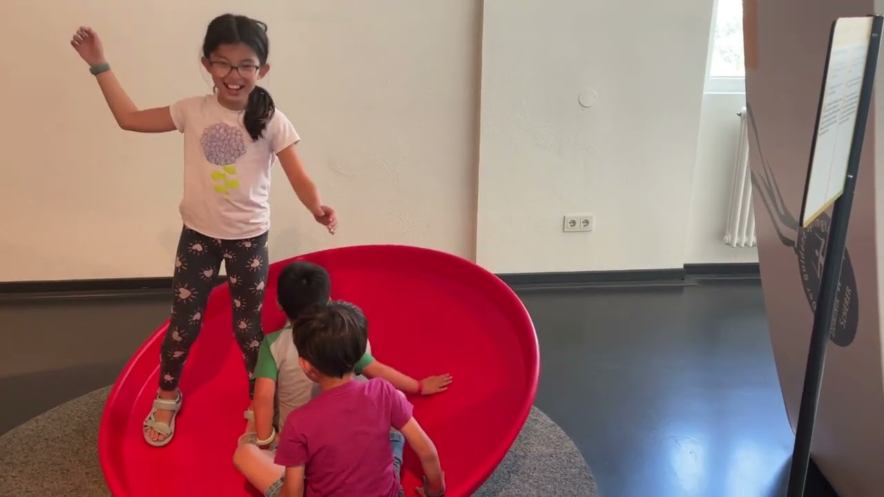 My kids fooling around with exhibits at Dynamikum science museum in Pirmasens, Germany July 2022