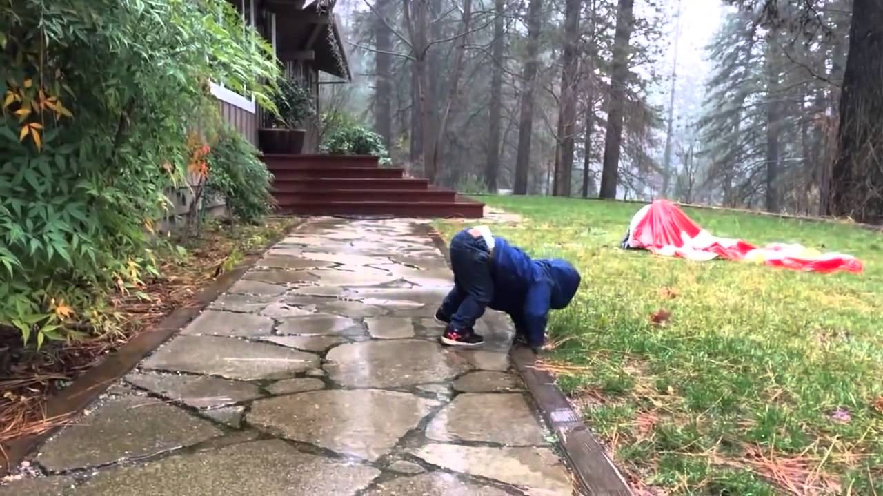 Image result for baby playing on rain