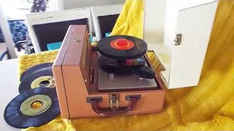 RCA 6-EY-3A 45 RPM automatic record player playing a stack of 45