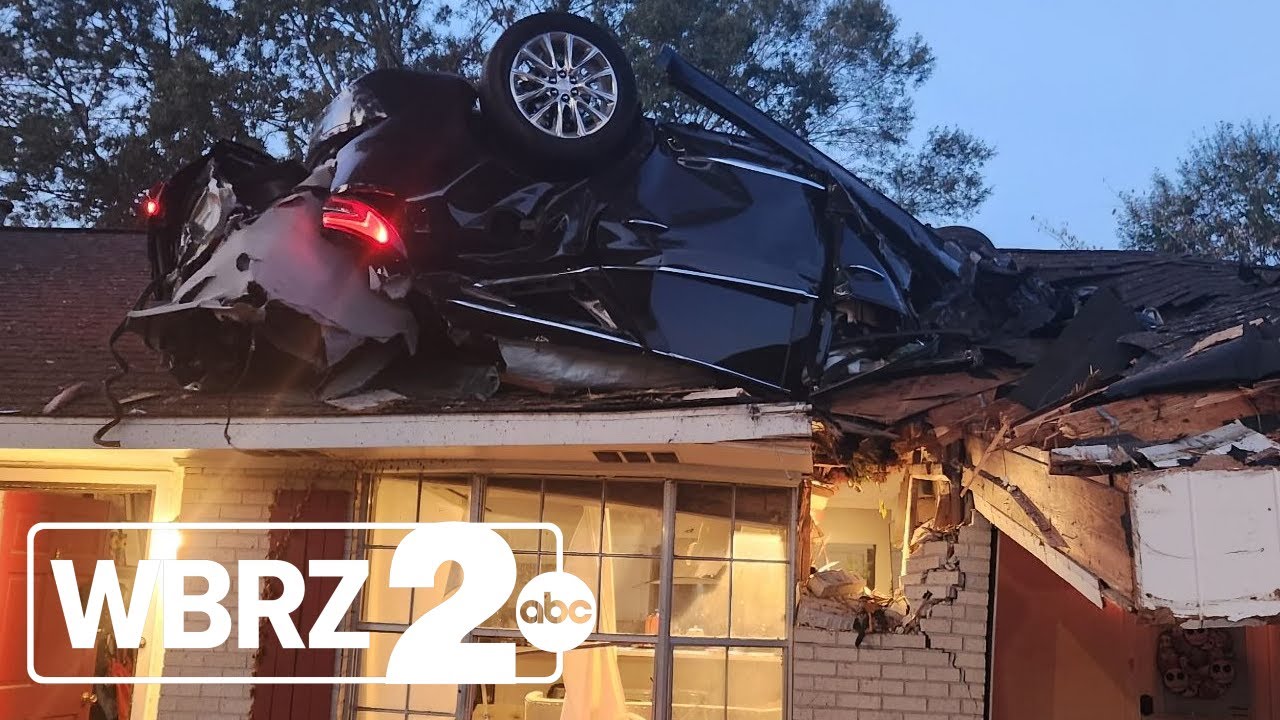 Car goes airborne, lands upside down on roof of Zachary home - YouTube