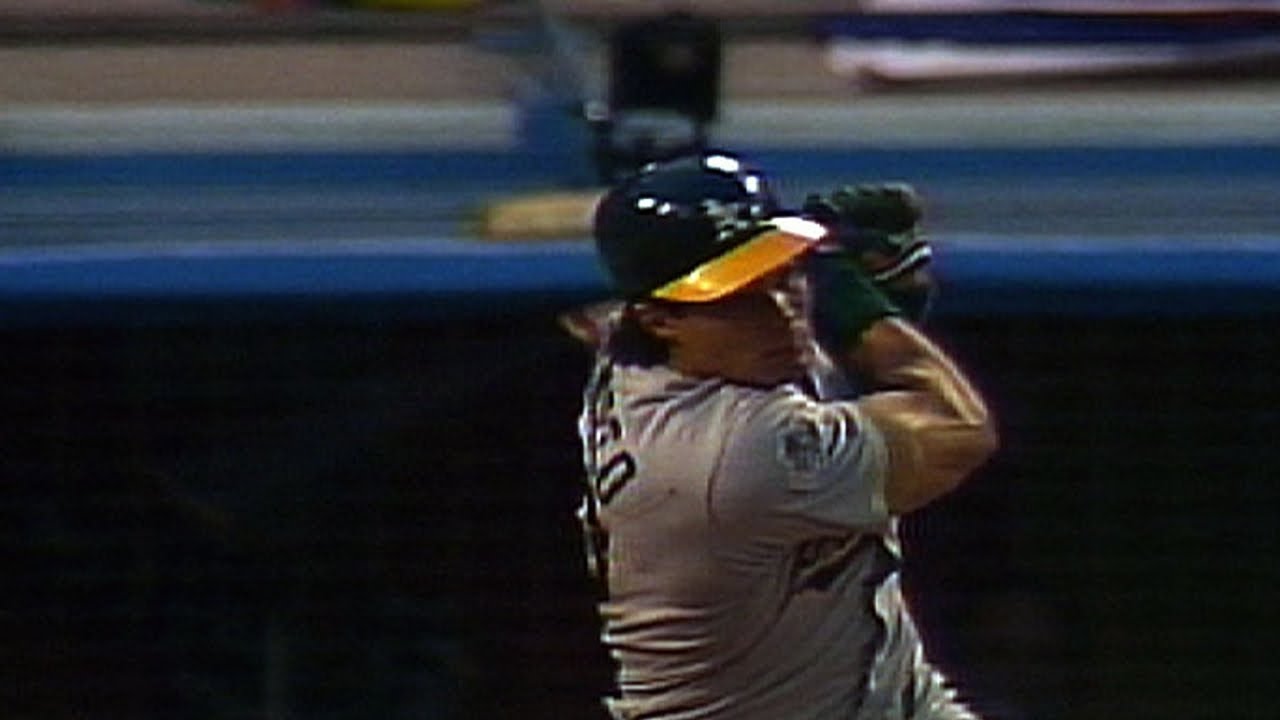 Canseco grand slam hits camera 