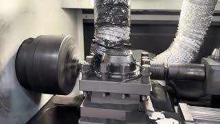 🧩A graphite component is being machined inside the CNC system.