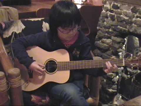 Kazuki plays "Pua 'Olena" slack-key guitar
