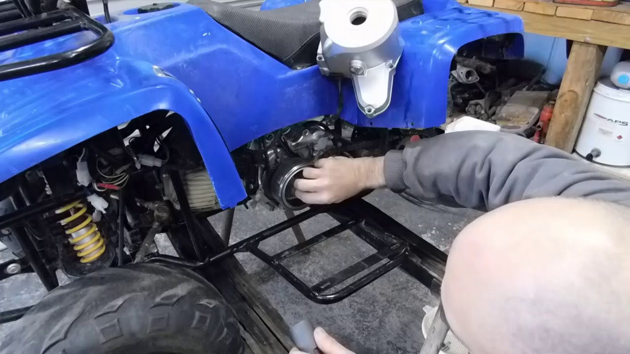 110cc quad bike flywheel removal YouTube