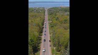 Bill Tomlinsons Tow Truck Funeral procession coming up Sanborn Ave to Mt Hope Cemetery. 5-26-2023