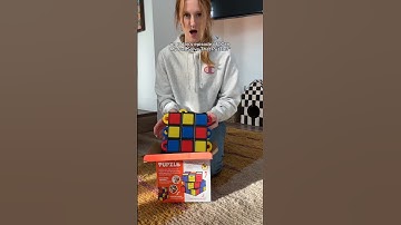 My Cat Solves a Rubik’s Cube🤯 #shorts #sphynx #cats #hairlesscat #puzzle