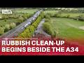 Clean up begins on mountain of rubbish dumped beside the A34