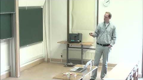 Dr. Axel Kleinschmidt | Infinite discrete symmetries near singularities and modular forms