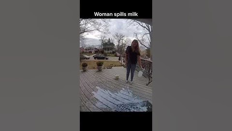 Woman Accidentally Breaks Milk Bottle and Spills Milk - 1410763