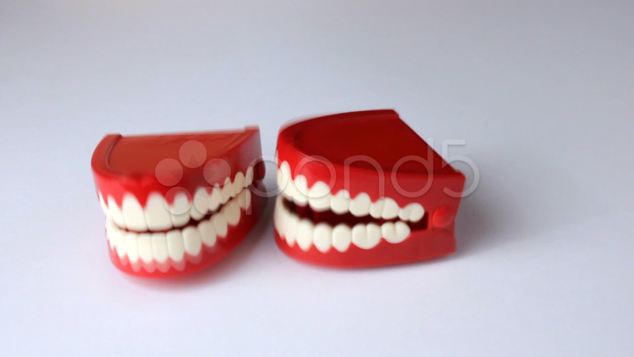 Pair Of Clacking Teeth. Stock Footage YouTube