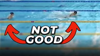 swimmer switches lanes in the middle of a championships race (DQ)