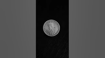 Spinning of Coin in Slow Mo