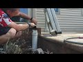 Gutter cleaning and unclogging stubborn downspouts