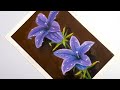 Drawing flowers with water drops using oil pastels
