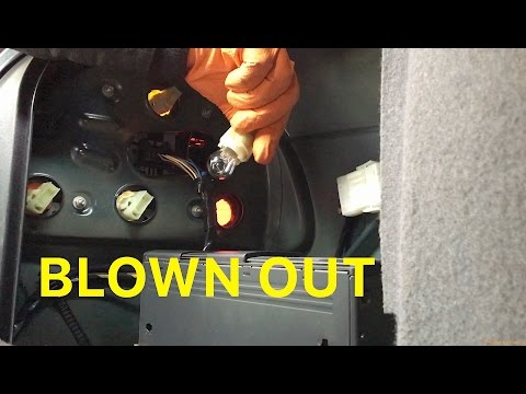 Replacing a BMW Brake Light Bulb. No Tools Needed.