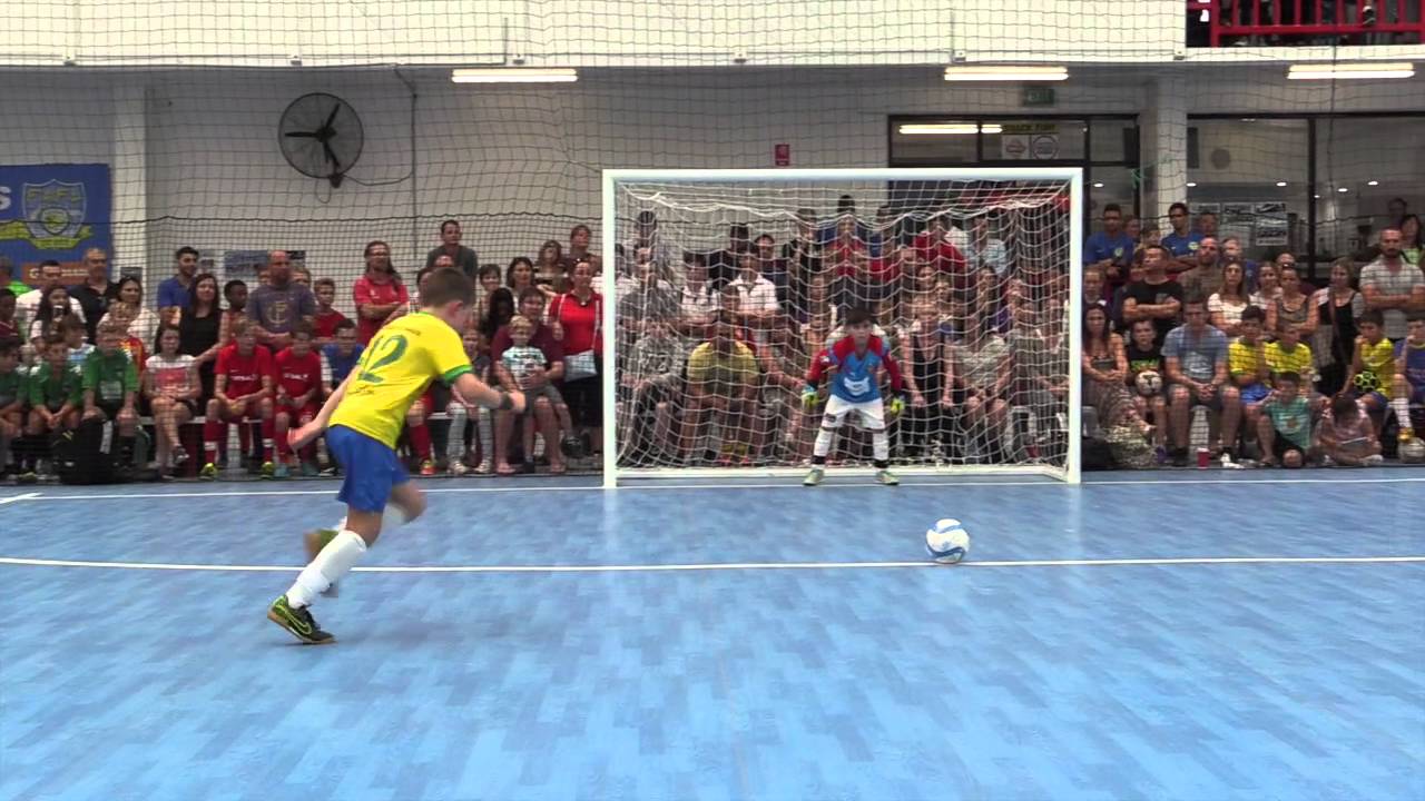 Quarter final penalty shoot-out in packed futsal stadium 
