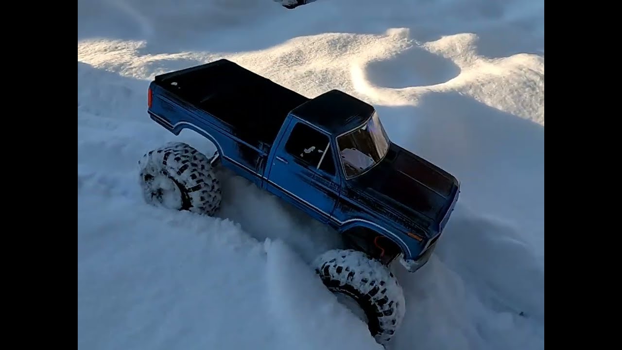 RC crawlers in the snow. Making new trails in the fresh snow.