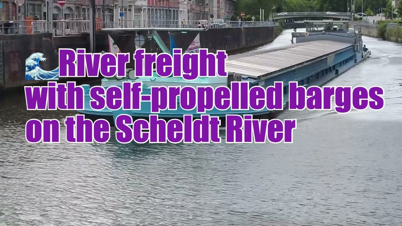 🌊River freight with self-propelled barges on the Scheldt River in Tournai, Belgium ⛴️🇧🇪⚓🌉 