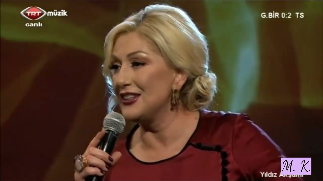 Muazzez Ersoy-gönül penceresinden ansızın bakıp geçtin