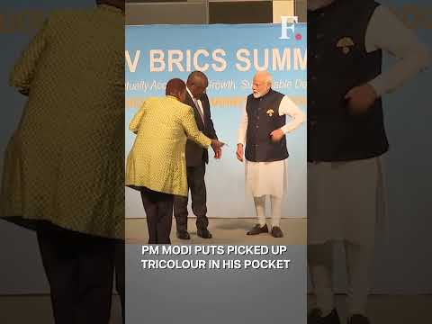 PM Modi Picks Up Tricolour Kept on Floor to Mark His Spot at BRICS Summit | Subscribe to Firstpost
