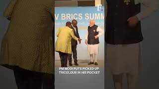 PM Modi Picks Up Tricolour Kept on Floor to Mark His Spot at BRICS Summit | Subscribe to Firstpost