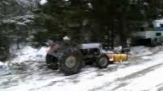 Steve Bonser plows our driveway with a 1948 Ferguson Tractor