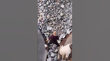 Cargo ship sand and gravel unloading in action - Good tools and machinery make work easy