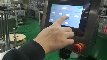 How to operate automatic tapered conical cup labeling machine