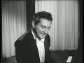 Liberace performs a pretty girl is like a melody
