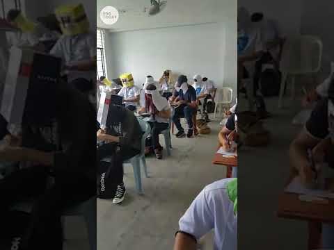 Students wear hilarious ‘anti-cheating’ hats during exams | USA TODAY #Shorts