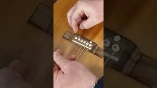 How To Fix Broken String : Acoustic Guitar String Replace