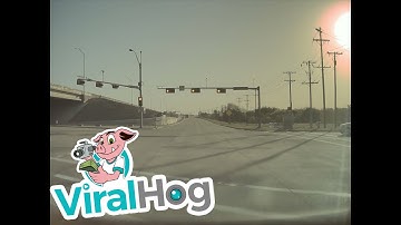 Red Light Runner Causes Crash || ViralHog