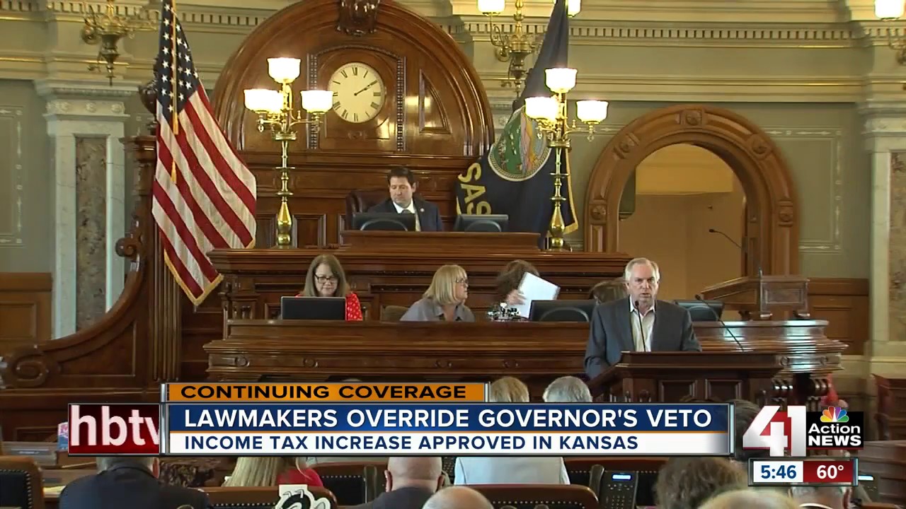 Kansas lawmakers override veto of tax increase - YouTube