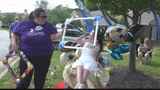 School holds drive-by graduation for two special students