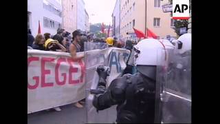 Protesters Confront Riot Police At Economic Forum