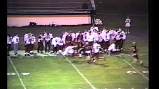 1994 Pulaski County's Eric Webb (4) delivers a forearm shiver en route to a 97 yard fumble return TD