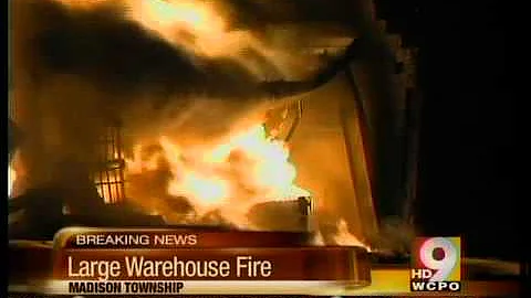 Large warehouse burns, residents warned