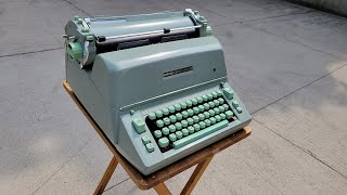 Typing outside on a 1964 Hermes Ambassador typewriter