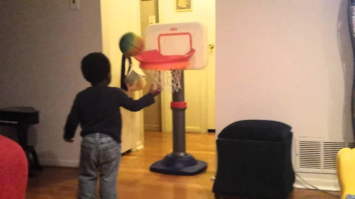 Nathaniel shooting hoops