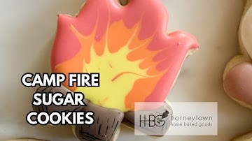 Learn a simple wet-on-wet technique to decorate campfire sugar cookies with royal icing!